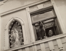 Woman and Dog in Window