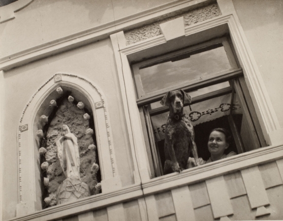 Woman and Dog in Window